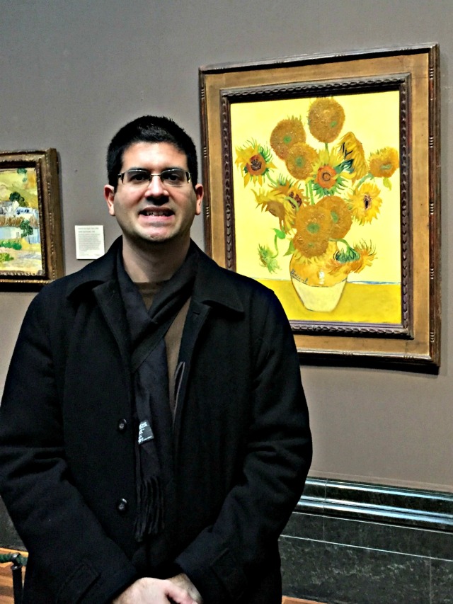 Scott in front of Van Gogh's Sunflowers, on display at the National Gallery in London